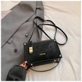 Retro black matte square handbag with gold hardware and logo on grey blazer - Standard Type / Black