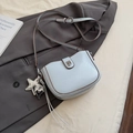 Light blue arc-shaped crossbody bag with silver star charm and brown edge details - Blue with Charm