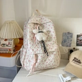 Quilted white backpack with pink bow print, sheep plush charm and woven tassel detail - With Charm / White