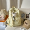 Pale yellow quilted backpack with blue butterfly patterns and white plush doll pendant - With Charm / Yellow