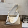 Detail of white PU leather crescent bag with adjustable strap and cute bear charm - White with Pendant