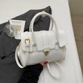 Elegant white faux leather crossbody bag with golden metal buckle and top handles - Off-white