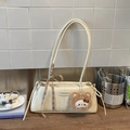 Detail of cream white underarm bag with plaid bow and brown teddy bear charm accessory - Off-white