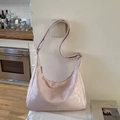 Vintage light pink soft leather tote bag with wide shoulder strap in a home setting - Pink Without Pendant