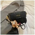 Black woven leather small square bag with gold buckle and plush mascot pendant - Black