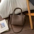 Brown lychee leather bucket bag with top handle and adjustable shoulder strap for daily use - Coffee without Pendant