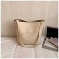 Minimalist beige pebble leather tote bag with functional front pockets and slim strap - White