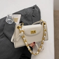 Detail of a creamy white square crossbody bag with a gold twist lock and chunky chain - Off White