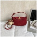 Deep red leather dumpling bag with gold twist lock and cute teddy bear charm - Red with Pendant