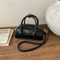 Elegant black wrinkled leather cylindrical Boston bag with gold hardware and shoulder strap - No Pendant / Black