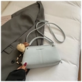 Light blue faux leather crossbody bag with cute teddy bear charm and sleek fashion logo - With Charm / Blue