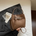 Chic brown lychee pattern leather bucket bag with silver lock and detachable strap - Khaki