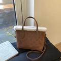 Vintage brown suede bucket bag with white faux fur trim and floral embossed patterns - Brown