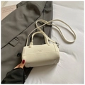 Elegante borsa Boston cilindrica in pelle bianco crema con doppio manico e tracolla - Bianco Riso (Senza Ciondolo)