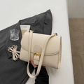 Chic off-white faux leather crossbody bag with golden hardware and litchi texture - Off-white