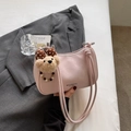 Pink dumpling style shoulder bag with a cute bear charm and minimalist logo print - Plush Bear Pendant Included / Pink