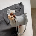 Light blue minimalist shoulder bag with teddy bear charm and MIKANUE brand logo - Plush Bear Pendant Included / Blue