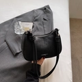 Minimalist black matte faux leather dumpling bag with decorative knot and zipper closure - No Pendant / Black