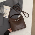 Vintage dark brown leather bucket bag with metal turn-lock and adjustable strap - Coffee No Charm