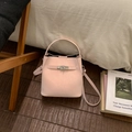 Pink faux leather bucket bag with silver metal padlock and detachable shoulder strap detail - No Pendant / Pink