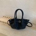 Close-up of black suede bucket bag with silver metal buckle and minimalist tote design - Black without Pendant