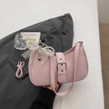 Detail of pink hobo bag with silver buckle and delicate pearl lace bow charm - Pink with Pendant