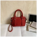 Deep red Boston style bag in matte faux leather with silver hardware and shoulder strap - Red (No Pendant)