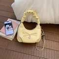 Hellgelbe Leder-Eimertasche mit Schleife und silberner Kette für Damen - Gelb