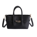 Minimalist black pebble leather tote bag with gold interlocking C-buckle and dual handles - Black