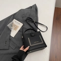 Black lychee texture bucket bag with gold lettering and adjustable shoulder strap - Single Bag / Black