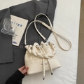 Chic beige bucket bag with woven handle and drawstring closure for women - Off White