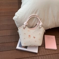 Creamy bucket bag with pink handles and cute cat cupcake prints in a cozy setting - Rice White (No Pendant)