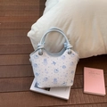 Chic blue and white bucket bag with cute bear print and decorative knot handles - Blue Without Charm