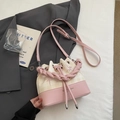 Pink and beige plaid bucket bag with star embroidery and woven handle in a daily lifestyle set - White and Pink
