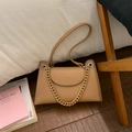 Detail of light brown lychee grain leather shoulder bag with decorative resin chain strap - Khaki