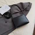 Minimalist black soft leather bucket bag with adjustable strap for commuting - Black without Pendant