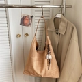 Warm orange textured hobo bag with adjustable strap and a coffee cup charm accessory - Khaki With Pendant