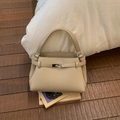 Chic beige lychee leather crossbody handbag with silver turn-lock and top handle - Apricot