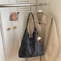 Charcoal grey canvas shoulder bag with abstract grid pattern and tassel coffee charm - Black With Pendant