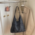 Dark blue geometric pattern hobo tote bag with black leather strap on a wall hook - Black without Pendant