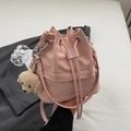Pink drawstring bucket bag with marble texture and plush puppy charm for women - With Charm / Pink