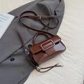 Deep brown glossy square handbag with silver heart pendant and adjustable strap - Brown with Pendant