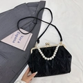 Fashionable black pleated shell bag with large faux pearl handle and metal clasp - Black