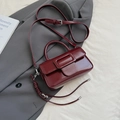 Elegant deep burgundy square handbag in glossy patent finish with a large square buckle - Red with Pendant
