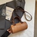 Chic brown cylinder boston bag in two-tone synthetic leather with shoulder strap - Brown