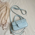 Elegant light blue square handbag with top handle and decorative heart charm strap - Blue with Charm
