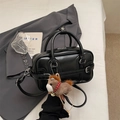 Glossy black bowling handbag with cute brown horse plush charm and crossbody strap - With Charm / Black
