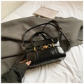 Glossy black mini square bag with golden heart-shaped lock and adjustable strap - Black