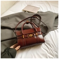 Chic burgundy leather handbag with golden heart buckle and dual strap options - Red