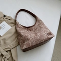 Brown floral jacquard tote bag with dark leather straps in a stylish aesthetic set - Brown